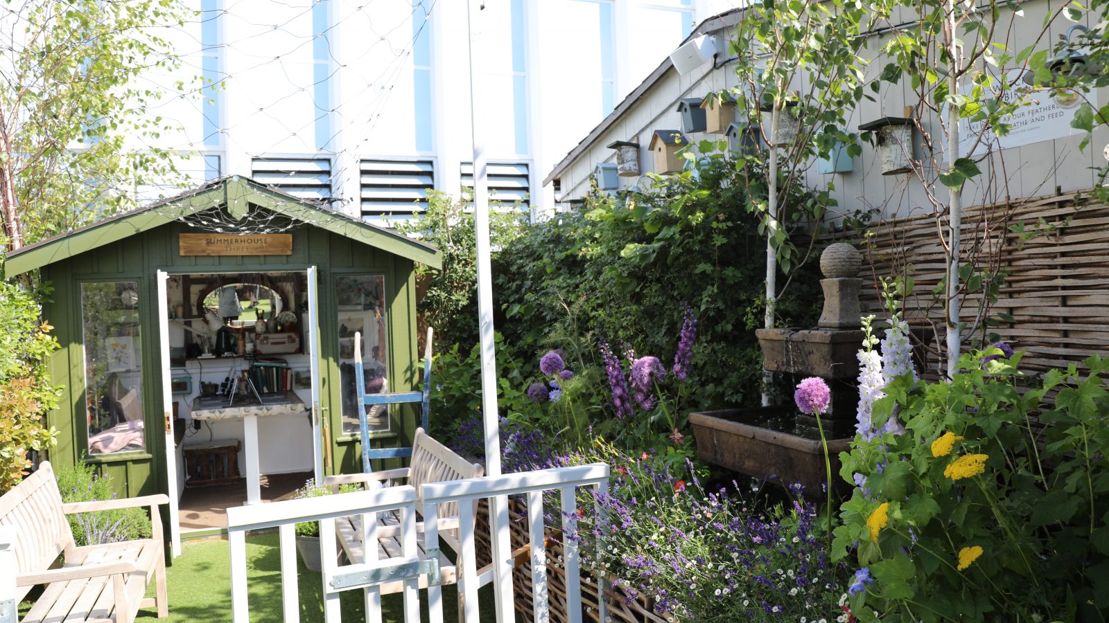 the rooftop garden features many different species of plant and