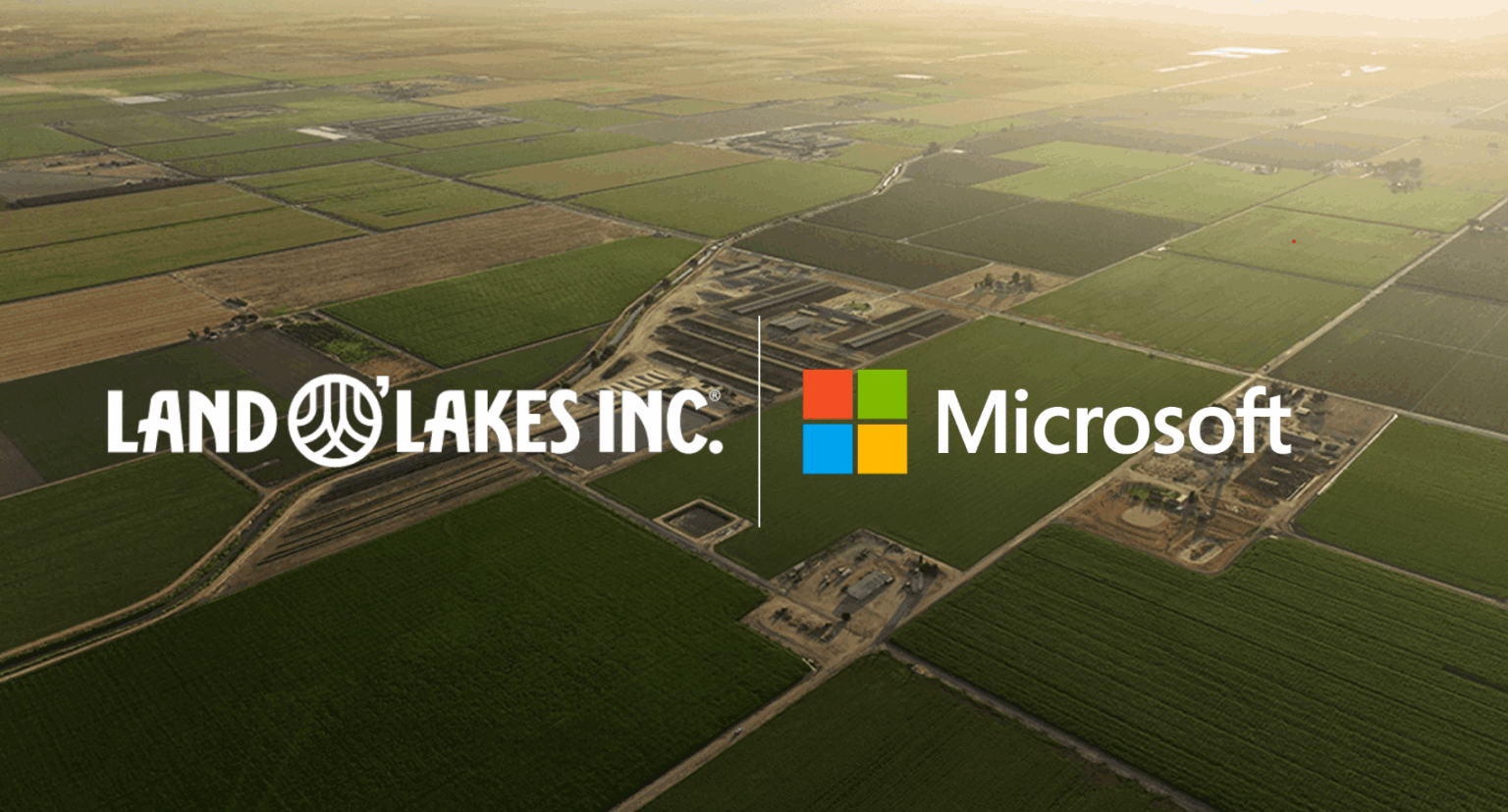 Aerial view of farmland with Land O’Lakes and Microsoft logos overlaid.