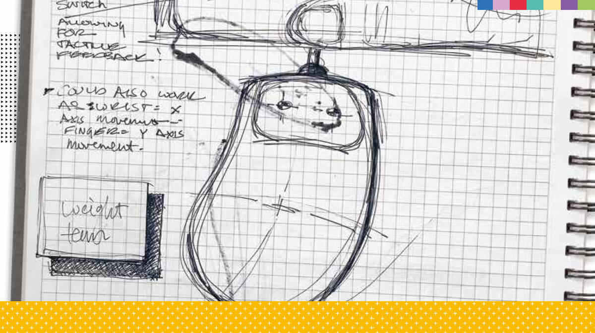 A sketch of a computer mouse on grid-lined paper.