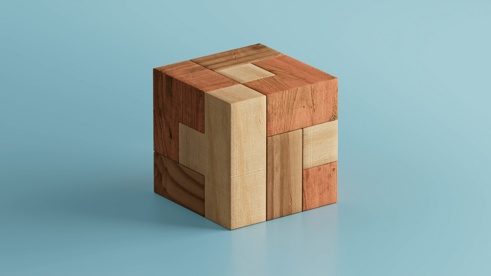 Wooden block made of interlocking geometric pieces.