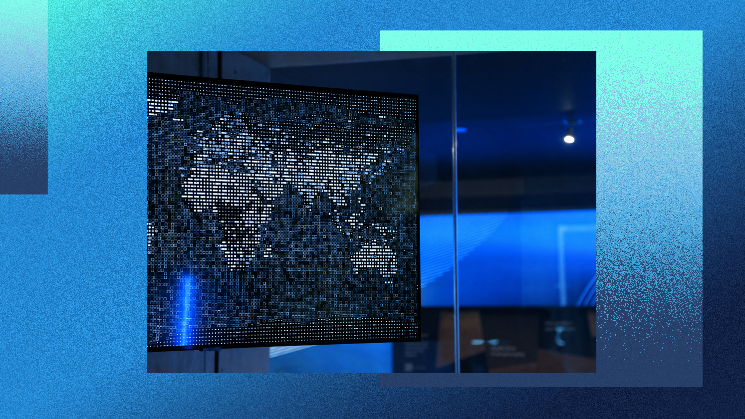 Digital display of a world map formed by glowing data dots in a blue-toned room.
