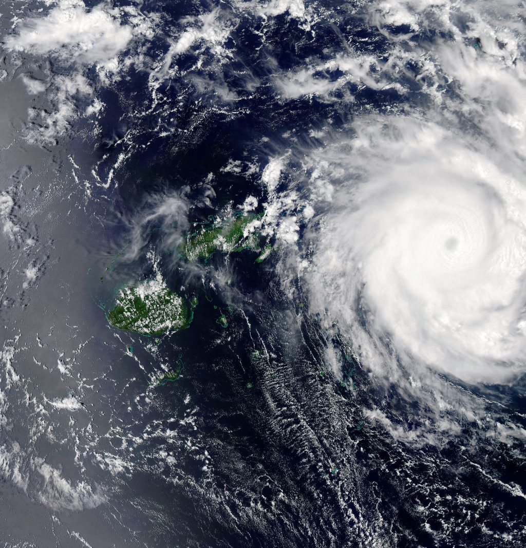 A satellite photograph of a tropical hurricane.