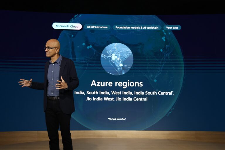 Microsoft chairman and CEO Satya Nadella giving a keynote address on stage