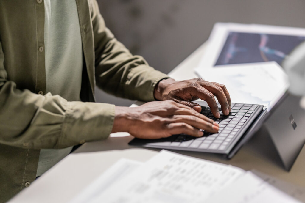 Person typing on a laptop