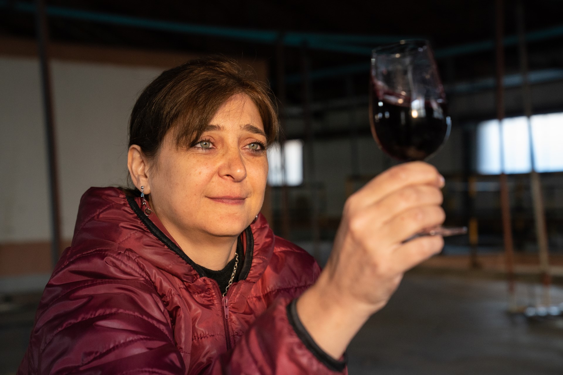 woman holding wineglass