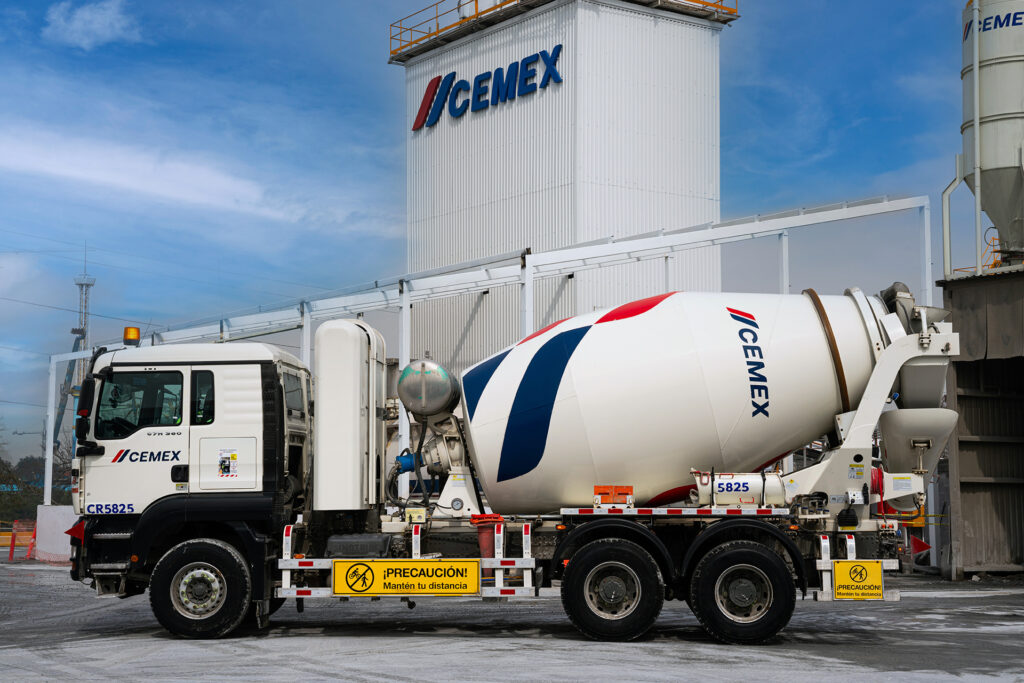 A Cemex truck in front of a Cemex plant