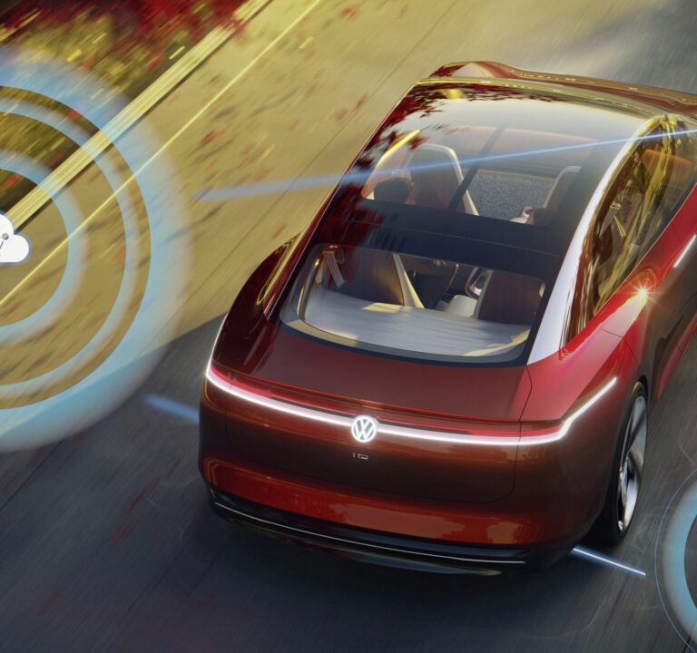 这张未来派照片展示了一辆红色的大众汽车，车外有模拟传感器。
