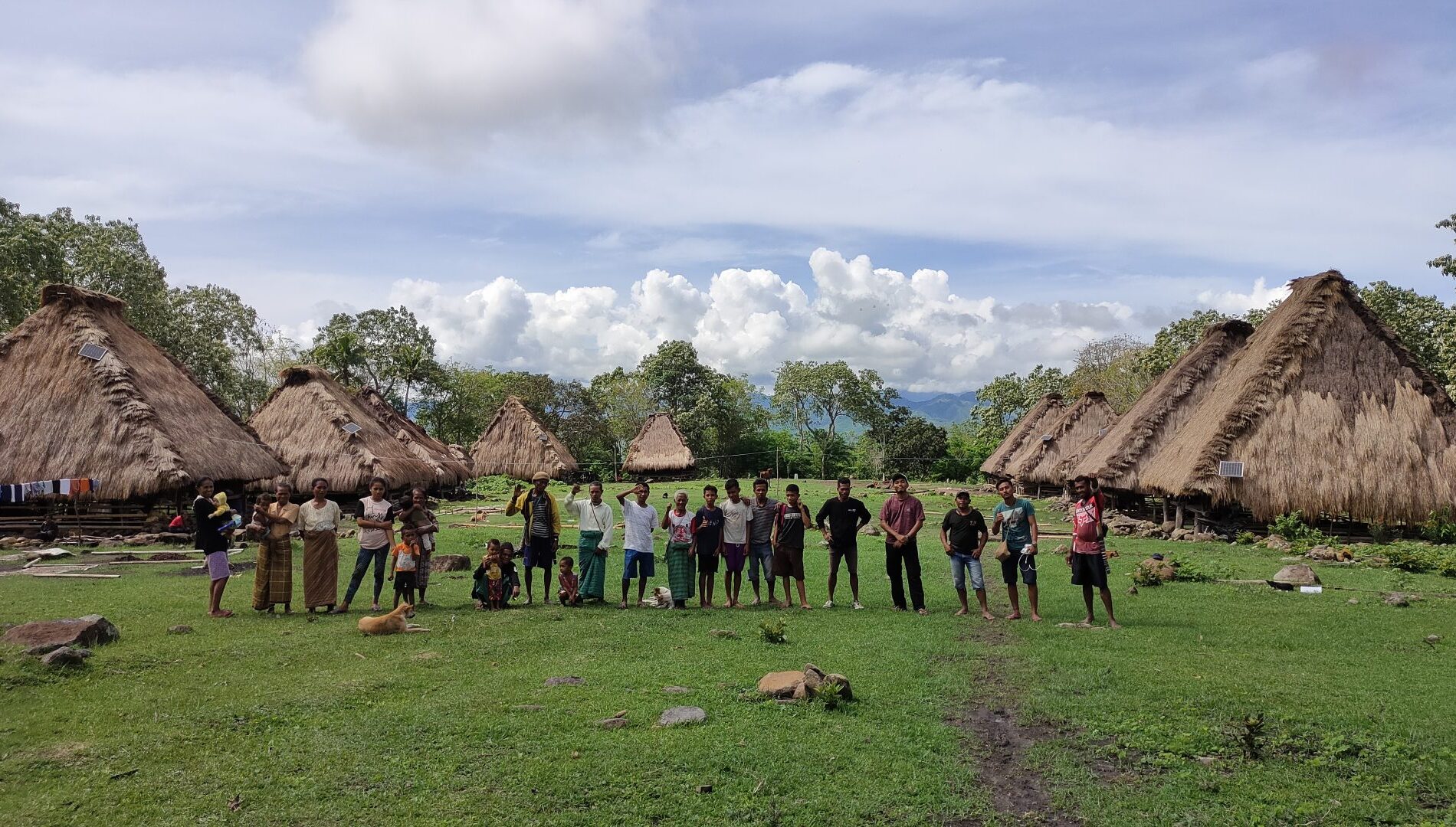 Several people standing in Kawa village on Flores island in Indonesia