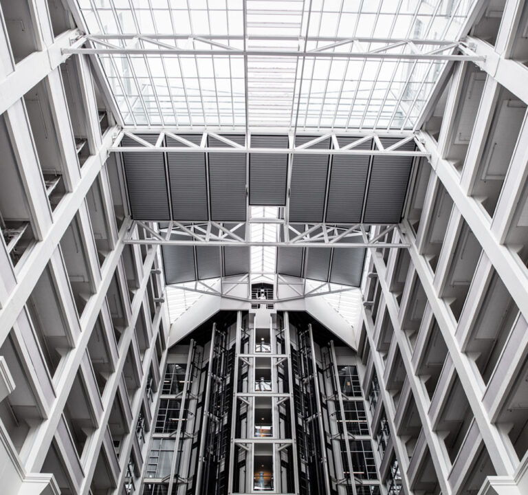 View looking up at the interior of an office building