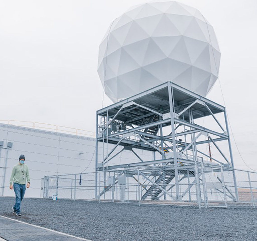 Person walking past a radar ground station
