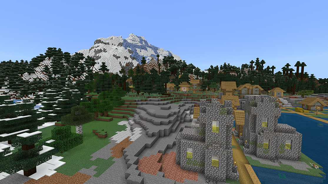 Minecraft environment showing a mountain, forest and houses by water