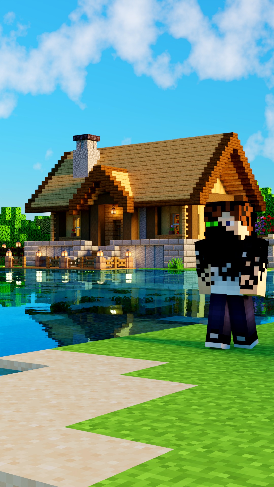 Minecraft figure standing on a grassy path next to water and a house