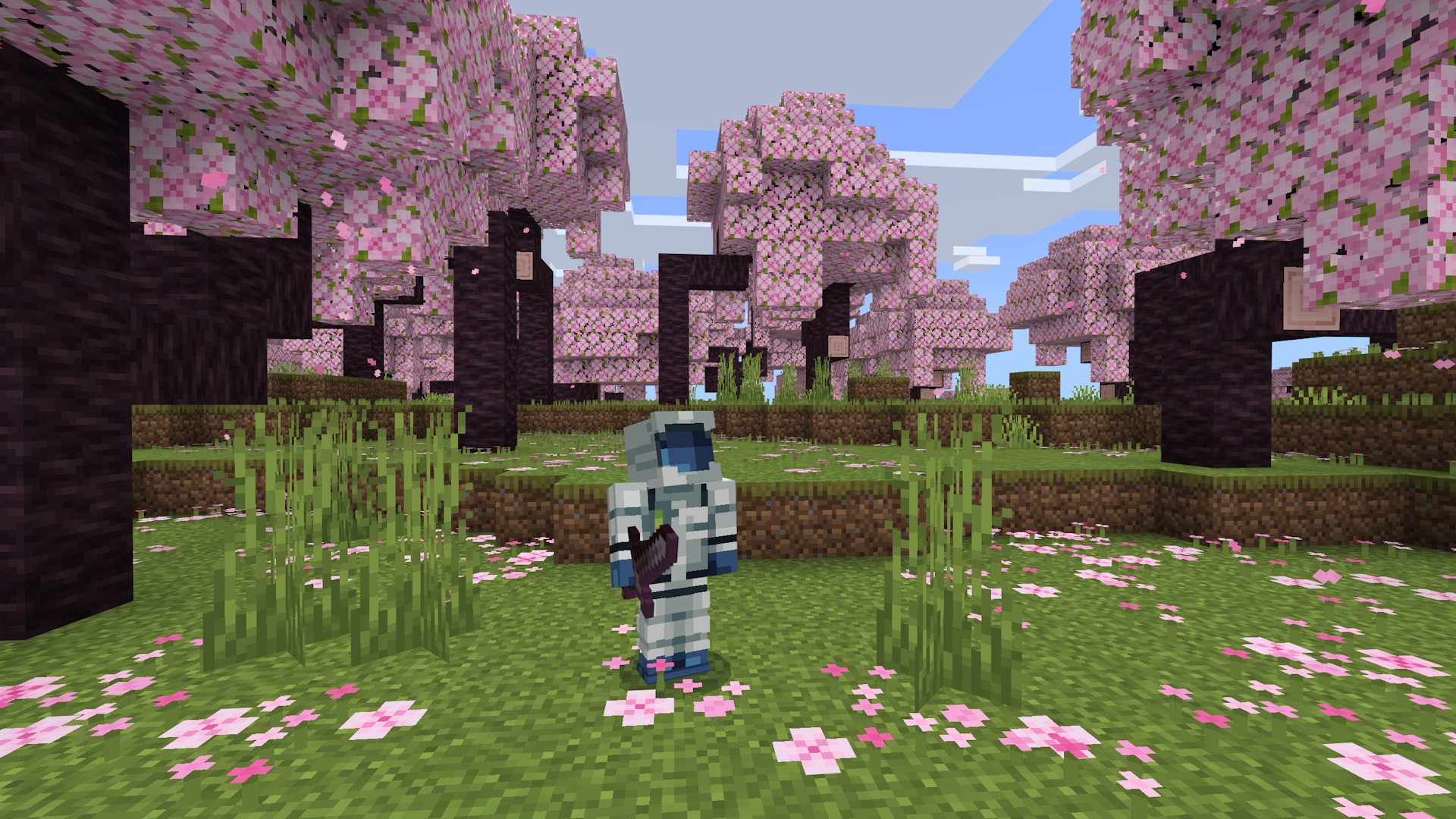 Miencraft figure standing amongst cherry blossoms