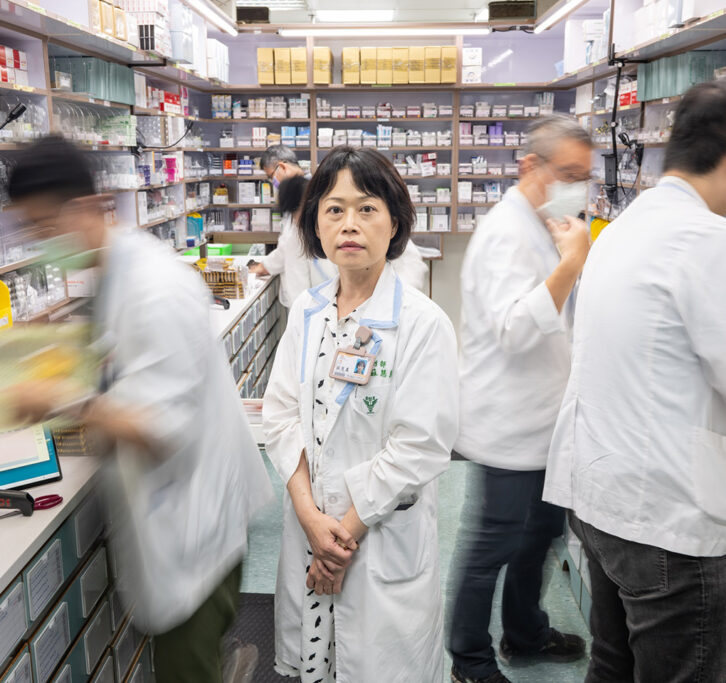A group of people in a pharmacy