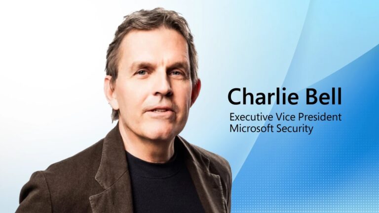 Headshot of a man wearing a suit jacket alongside the words "Charlie Bell, Executive Vice President, Microsoft Security."