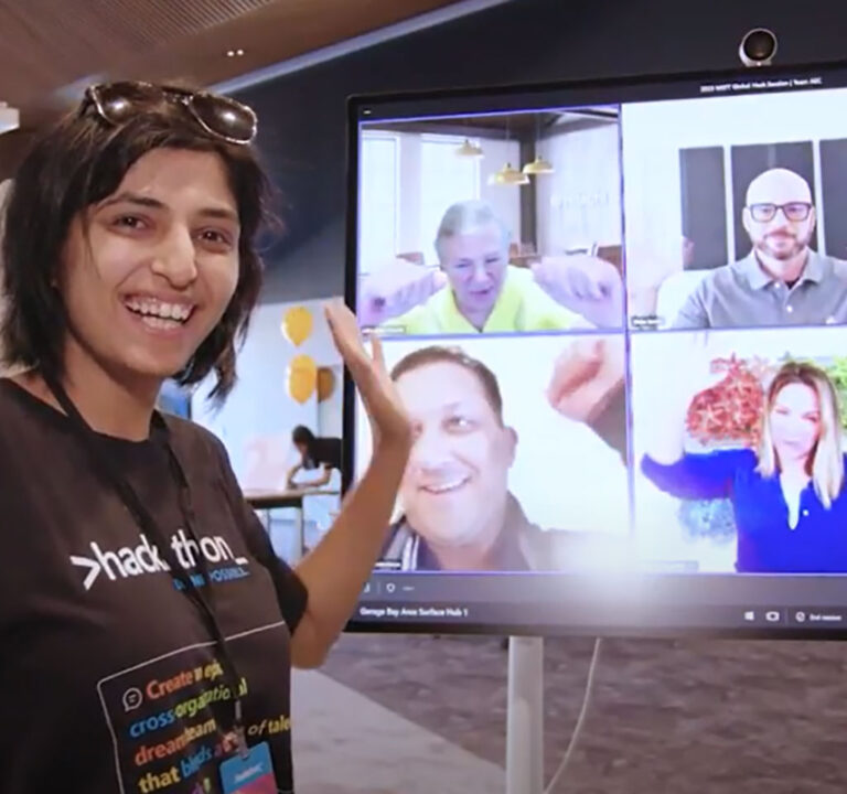 Woman interacts with people she's sharing a Teams meeting with