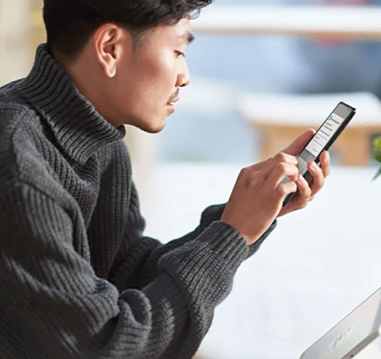 Man interacting with his phone