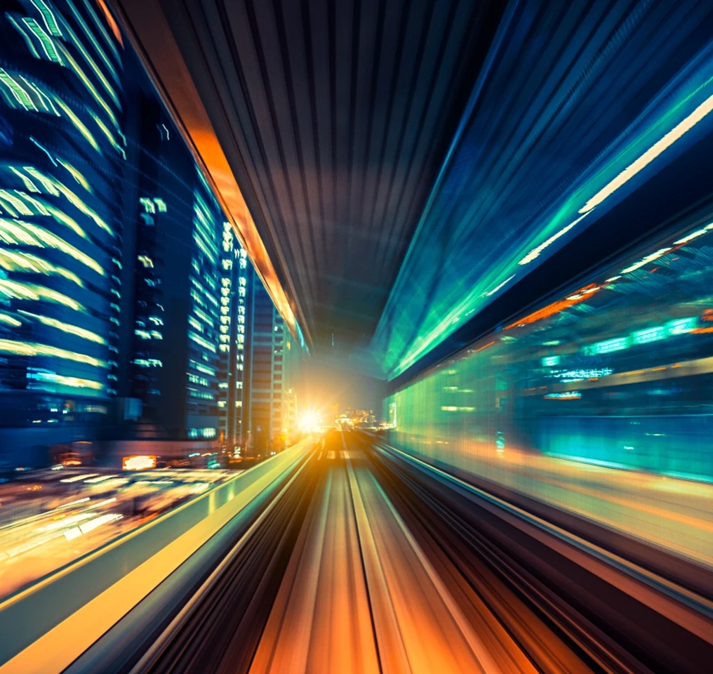 Blurred view of a nighttime street in a large city