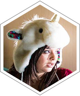 Alex Hebert, Xbox creative producer, in unicorn headpiece [Mobile format]