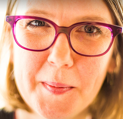 Thumbnail of a Microsoft Story Labs article, 'Talk to the hand!,' about Jenny Lay-Flurrie, Microsoft's Director of Accessibility and living with deafness