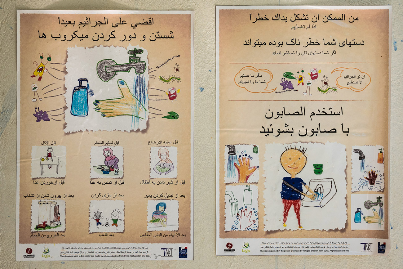 Poster in refugee camp with health and safety instructions.