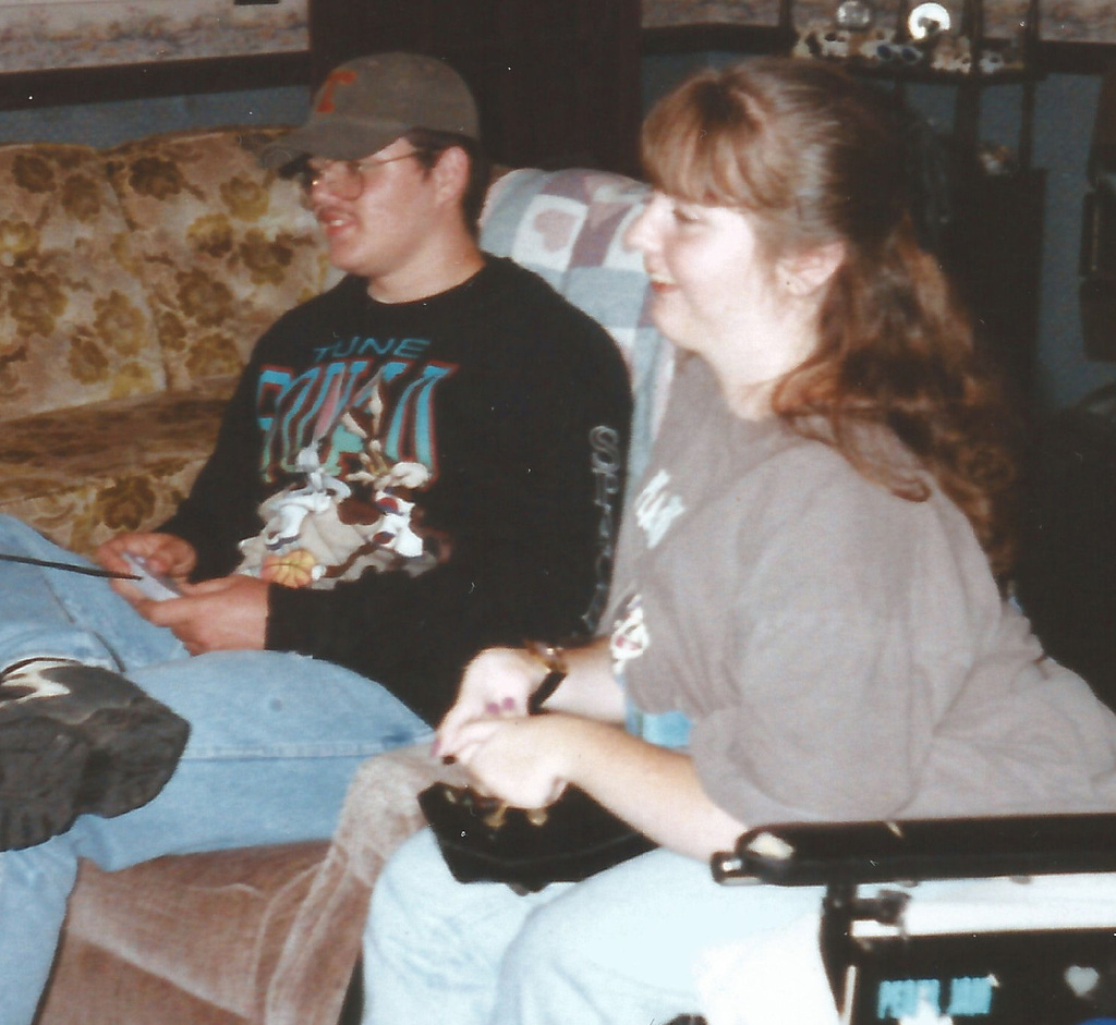April Dickerson, right, playing a game with a friend in 1997.