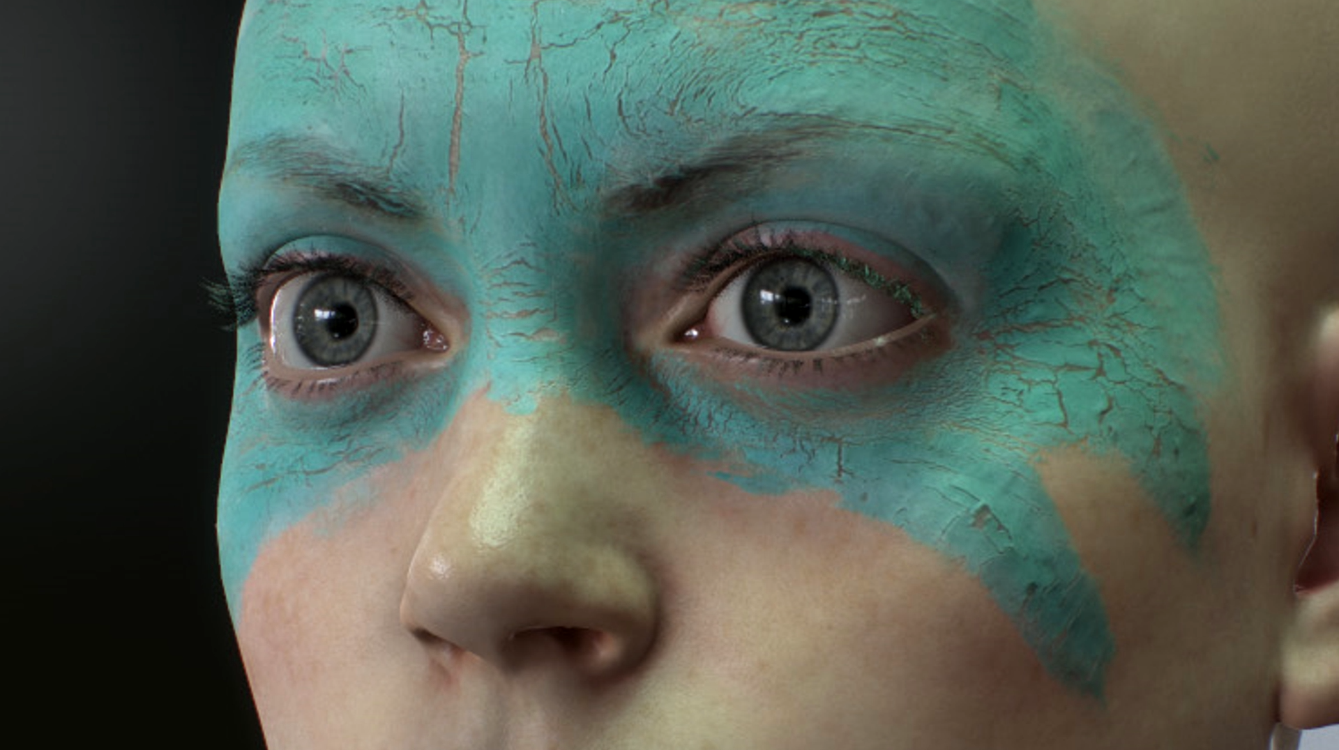 Лицо Мелины Юргенс с синей краской на лице в роли Сенуа из игры Hellblade: Senua’s Sacrifice