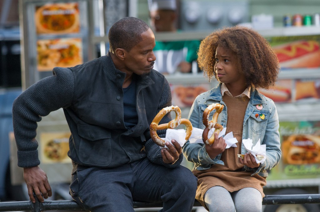 Stacks (Jamie Foxx) and Annie (Quvenzhane Wallis) spend some time together in Columbia Pictures’ “Annie.” Wallis used Skype to rehearse from New Orleans during the making of the movie. Photo credit: Sony Pictures Entertainment