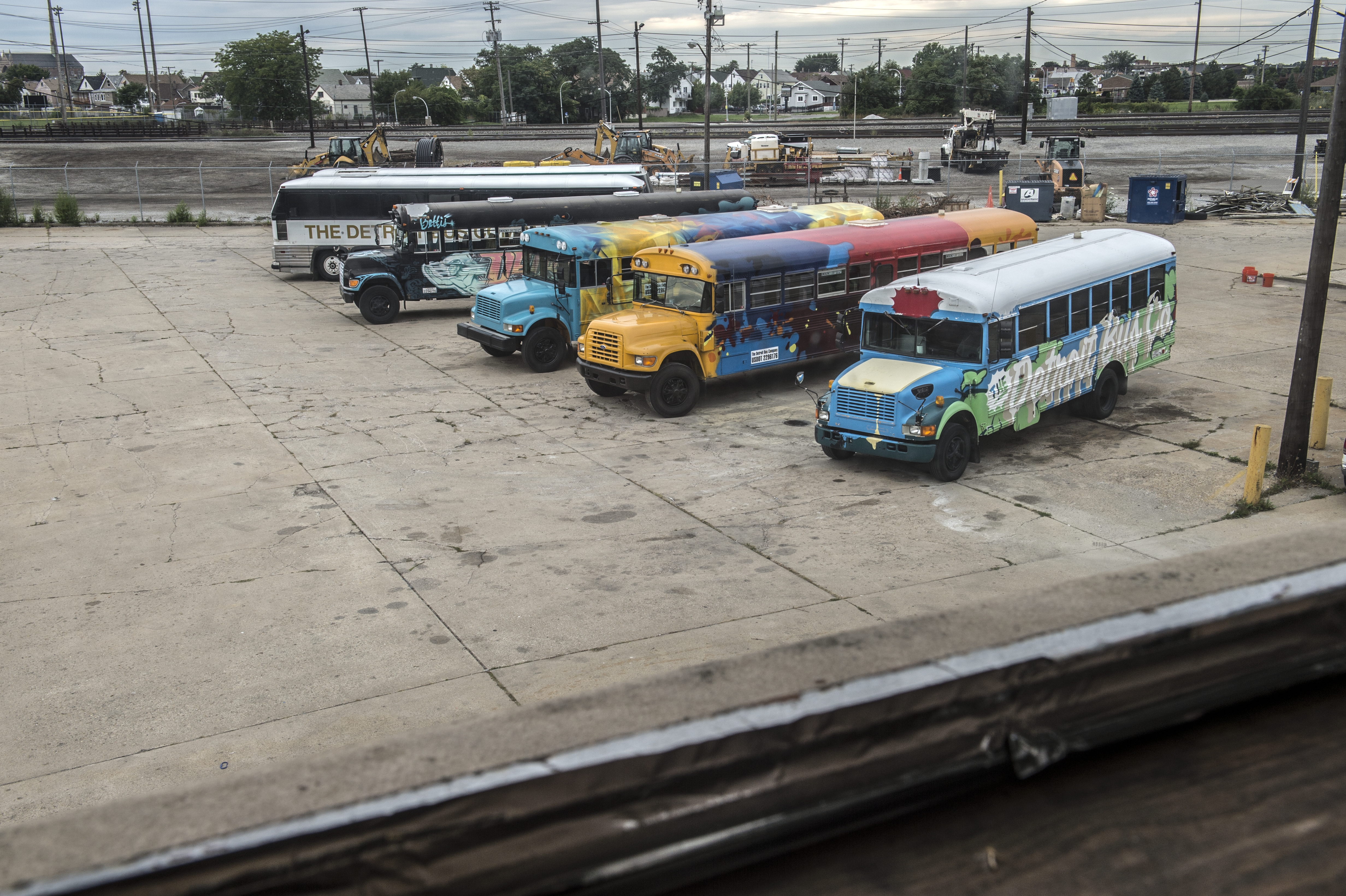 The Detroit Bus Company includes a fleet of refurbished school buses with vibrant paint, Wi-Fi and great speakers. “We have done big things as a city without fancy toys,” says founder and owner Andy Didorosi. Photo: Amy Vitale.