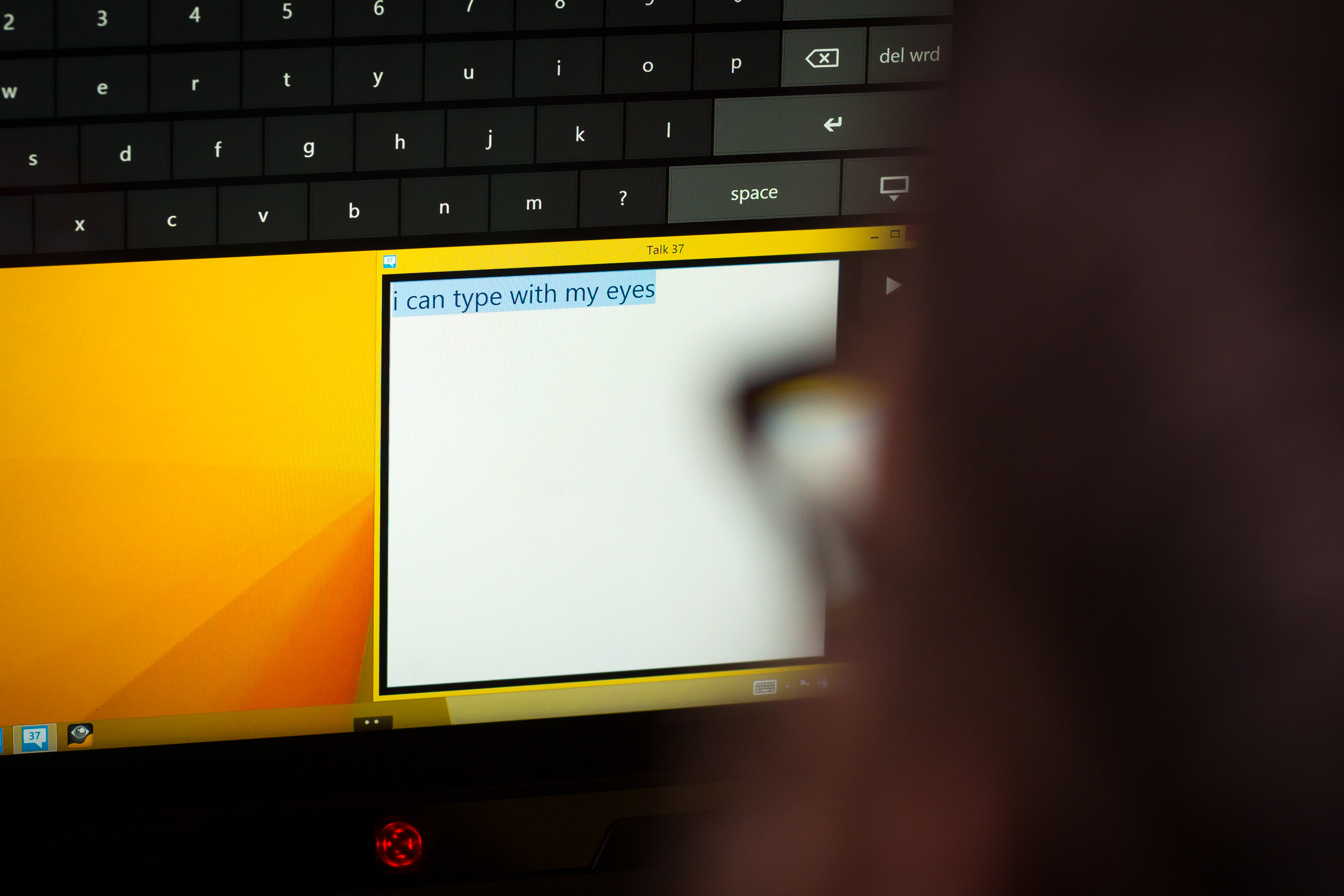 Software engineer lead Jay Beavers uses his team’s speech-generating device. Credit: Scott Eklund