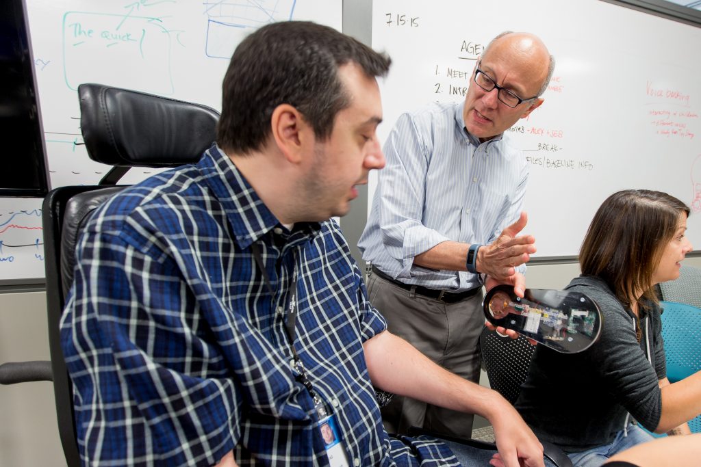 Microsoft Research Chief Scientist Rico Malvar chats with Intern Jeb Pavleas. (Photo by Scott Eklund/Red Box Pictures)