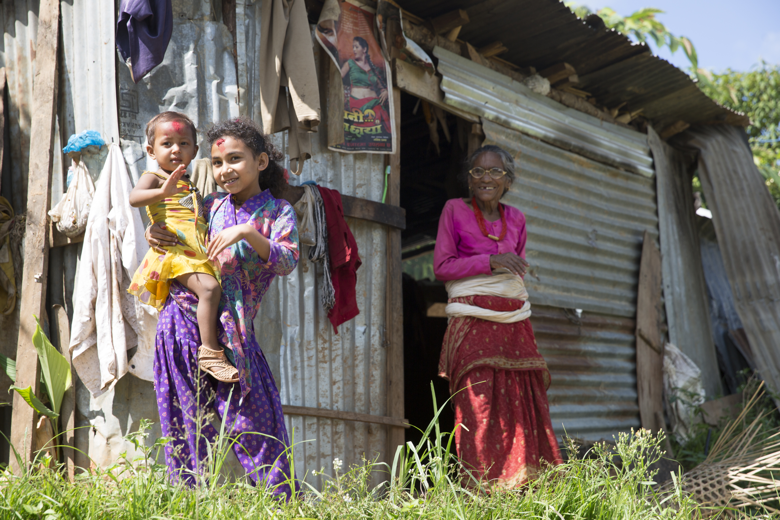 A grandmother and her grandchildren, in the Sindhupalchowk District.