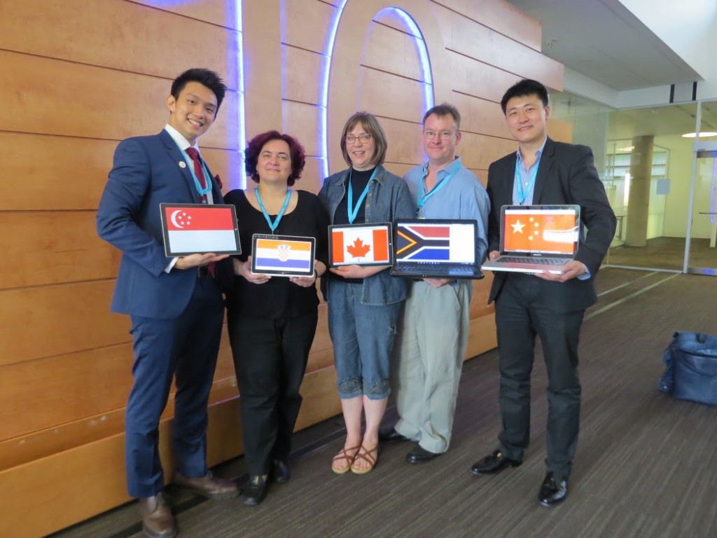 Andy Ng (left) with his winning project team: from left, Lidija Kralj (Croatia), Kelli Holden (Canada), Warren Sparrow (S. Africa) and Wei Wang (China)
