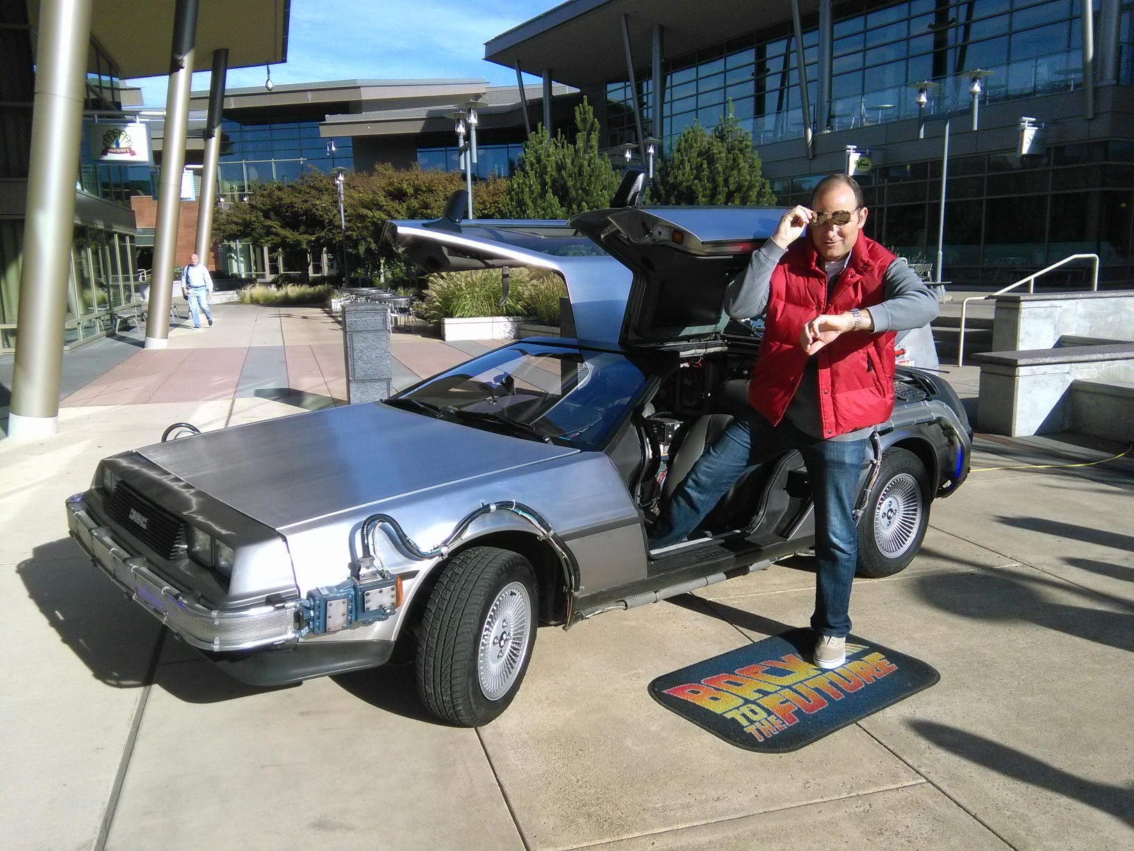 Lydon channels Marty McFly, Michael J. Fox’s character in “Back to the Future,” with a replica of the movie’s time machine on Microsoft’s Redmond campus Oct. 21.