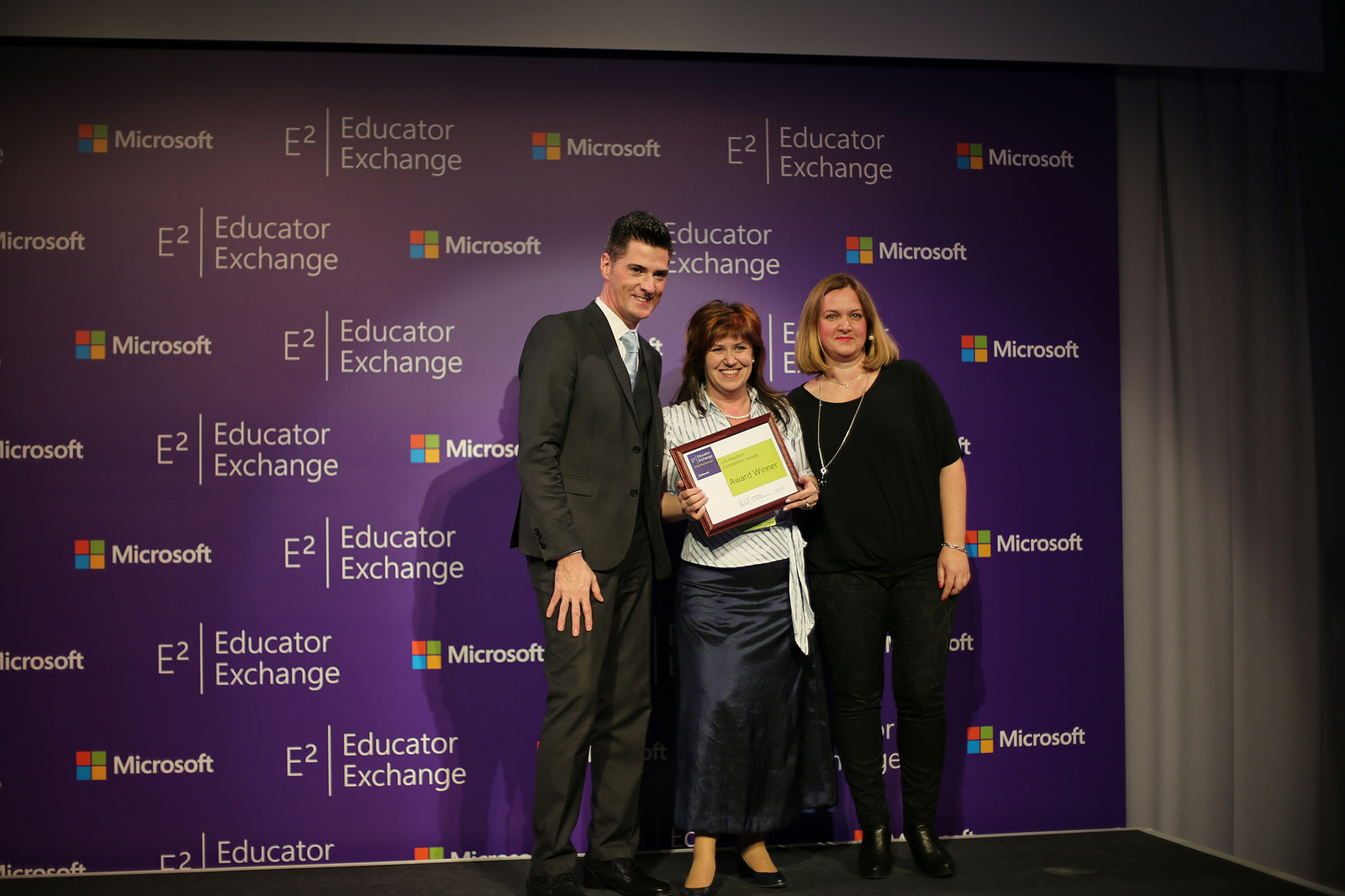 Anthony Salcito, Vice President, Worldwide Education, Microsoft, Ibolya and Gabriella Szentkuti, General Manager, Microsoft Hungary at the E² awards night
