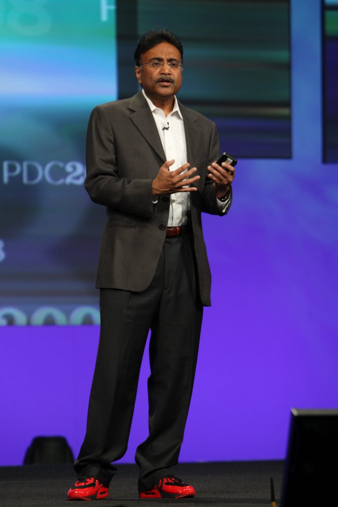 Amitabh Srivastava on stage at PDC 2008, wearing the "Project Red Dog" sneakers that Dave Cutler helped design.