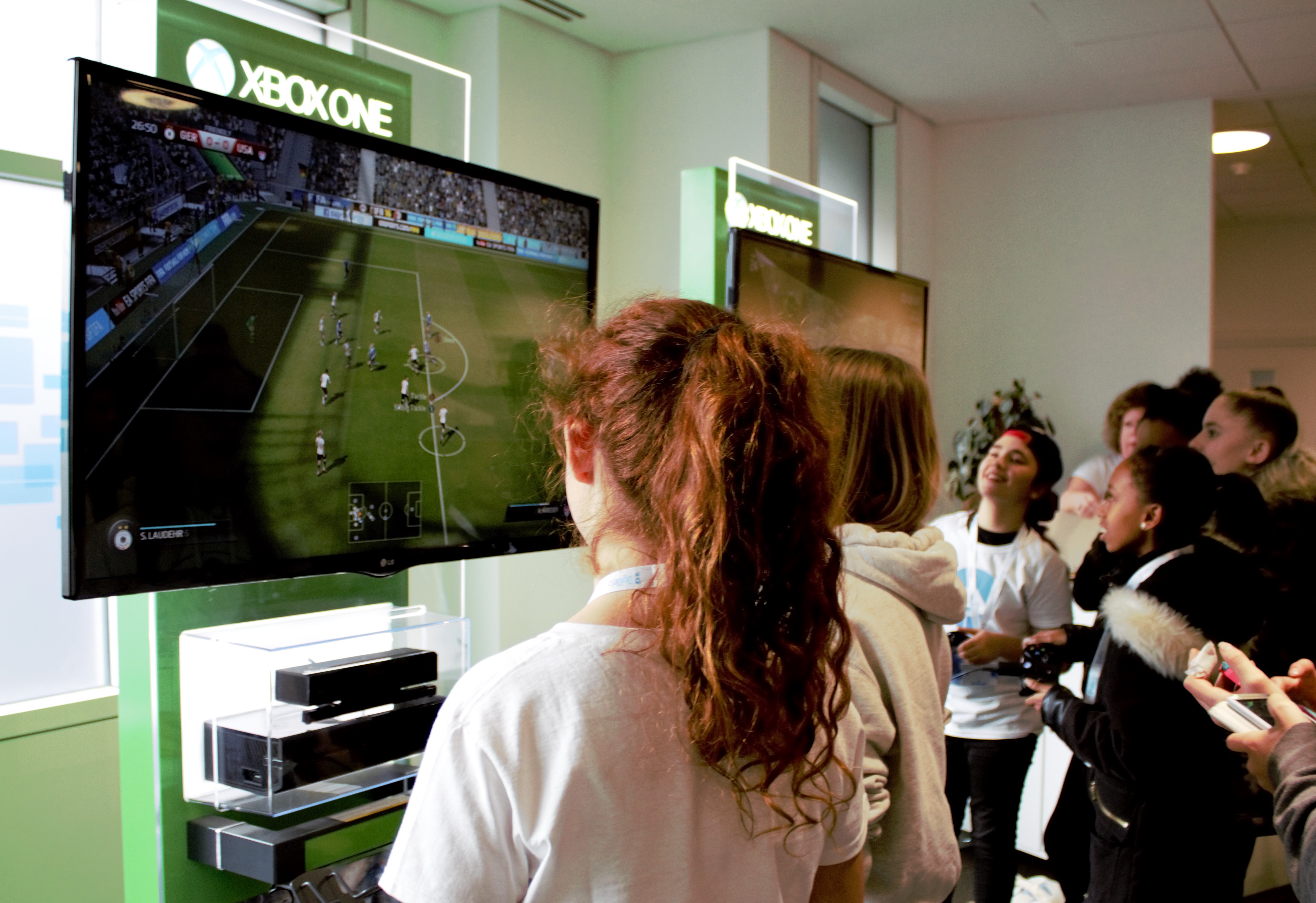 Schoolgirls play as female football teams on the Xbox version of FIFA