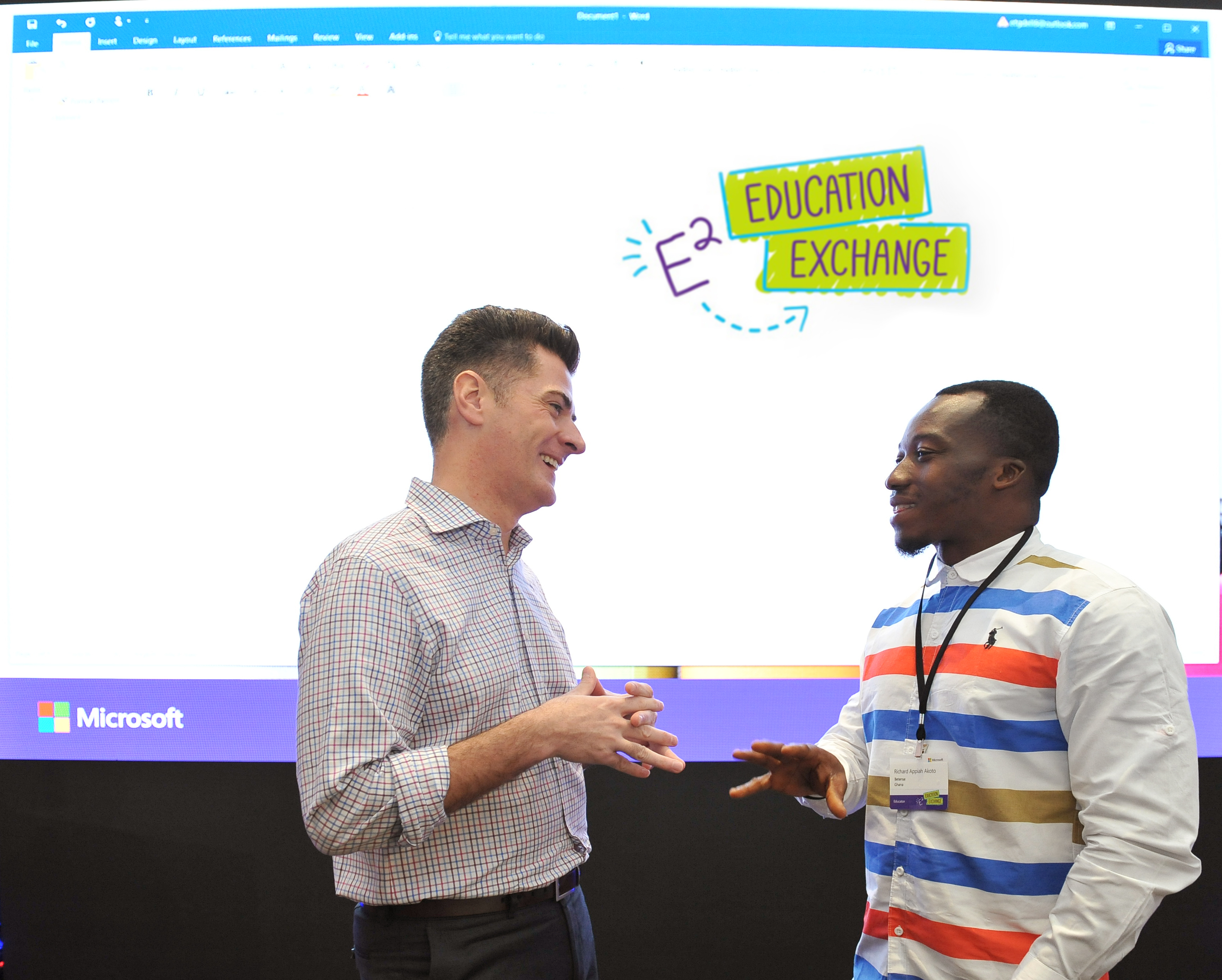 Anthony Salcito, Vice President, Worldwide Education, Microsoft with Richard Appiah Akoto, a Ghanaian teacher who became a social media sensation when he was photographed teaching Microsoft Word to his students on a chalkboard. 
