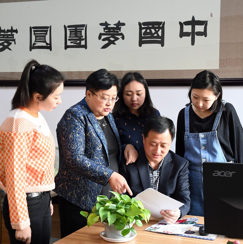Photo of employees at nonprofit in China.