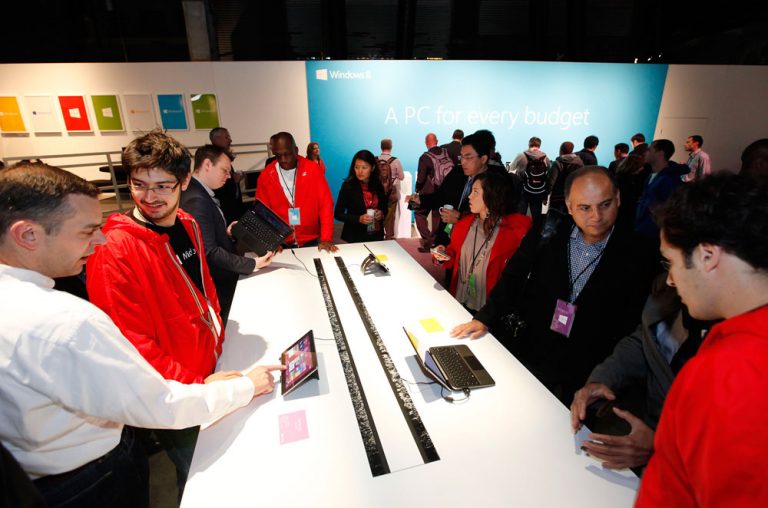Guests at the Windows 8 launch event in New York check out the devices available.