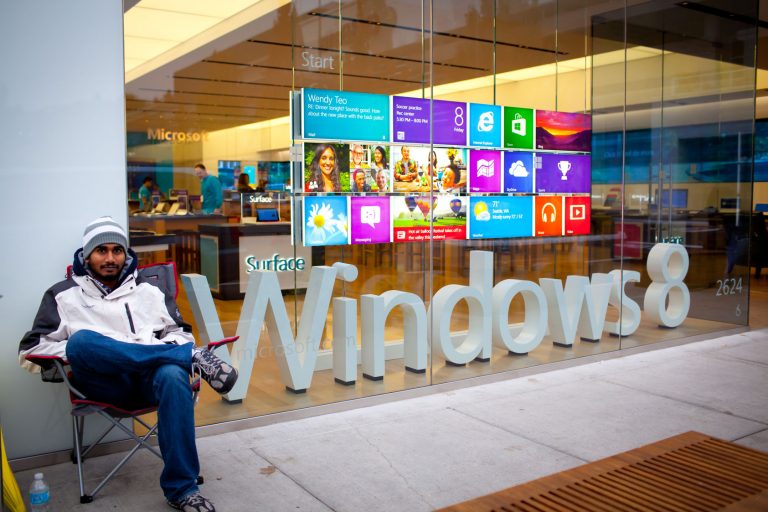 A prepared shopper waits for the Seattle Microsoft Store to open, Oct. 26, 2012.