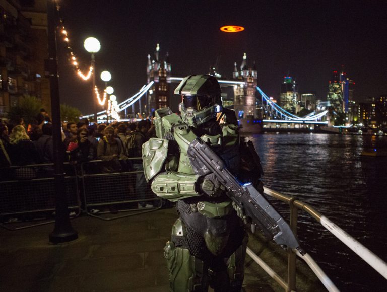 The Master Chief joins fans by Tower Bridge in London on Nov. 5, 2012 for the spectacular flight of the “Halo 4” Glyph to celebrate the blockbuster video game’s launch on Xbox 360.