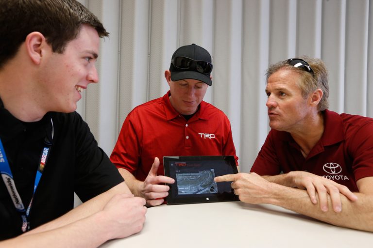 From left to right: Alex Bowman, RAB Racing with Brack Maggard #99 Nationwide driver; Darren Jones,  group lead for software development at TRD; and veteran driver Kenny Wallace discuss TRD’s Trackside app running on Windows 8.