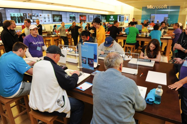 Customers take the Fresh Paint Memory Recall Challenge at the Surface 2 Midnight Launch on Oct. 21 at the Bellevue Square Microsoft Store in Bellevue, Wash.