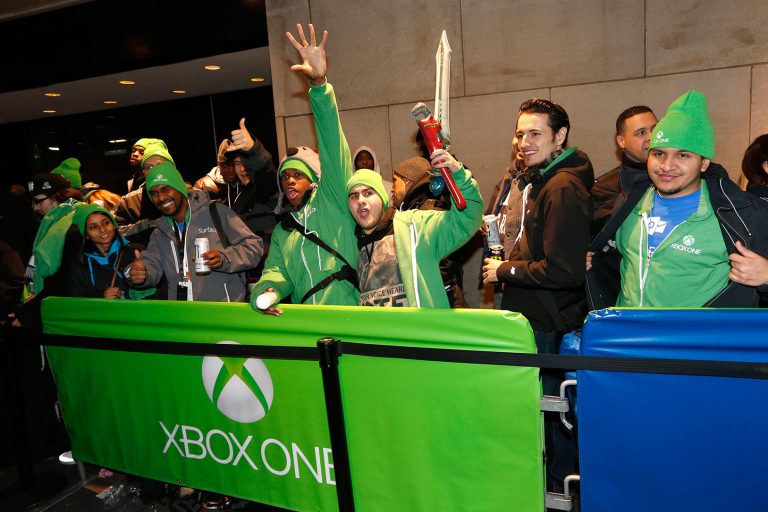 Fans celebrate the launch of Microsoft’s Xbox One outside of the Best Buy Theater in Times Square on Thursday, November 21, 2013.