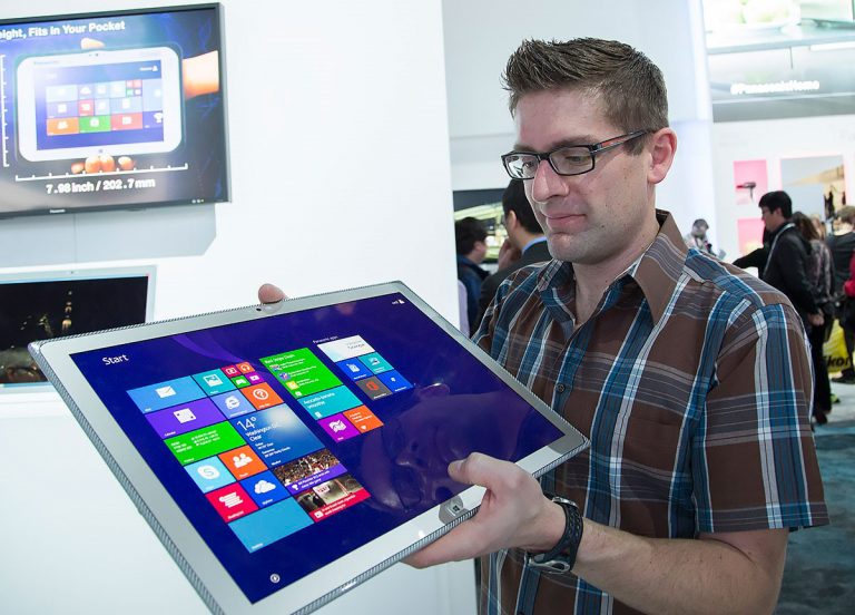 Microsoft’s Gavin Gear tests out the new performance model of the Panasonic Toughpad 4K tablet at CES 2014 in Las Vegas. Taking tablet PCs to the next level, this upgraded version of the Toughpad 4K tablet will be available in spring 2014 and comes with Windows 8.1 Pro, an Intel Core i7-3687 vPro processor, NVidia Quadro K1000M GPU and 2 GB of dedicated VRAM, in addition to 16 GB of RAM and a 256GB solid-state drive. If that wasn’t enough, the tablet boasts increased internal battery volume from the original Toughpad 4K, an added 5-megapixel rear camera and upgraded ports, including full-size Ethernet and mini-DisplayPort out.