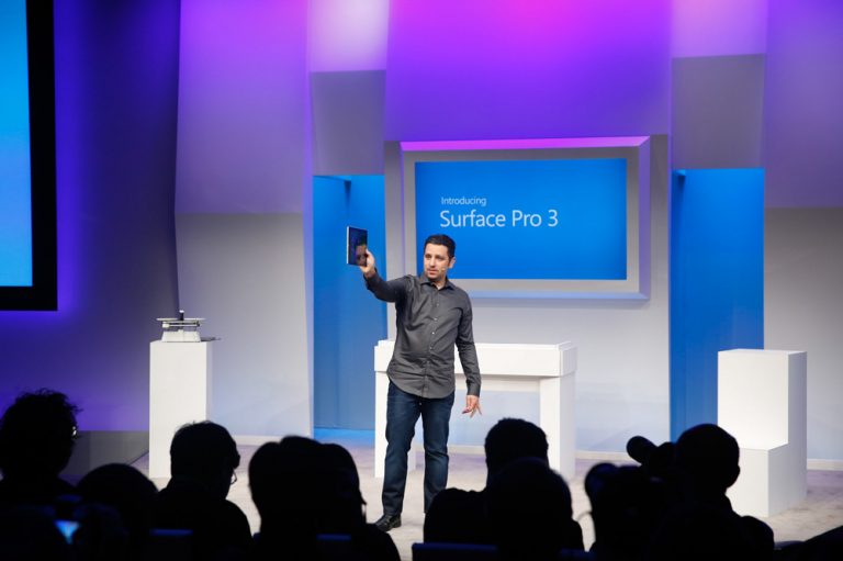 Panos Panay, corporate vice president, Microsoft Surface, shows how thin Surface Pro 3 is at the press event in New York City on May 20, 2014.