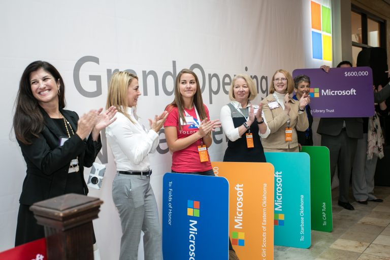 Local community organizations accepted more than $1.3 million in donations from the new Microsoft store at Woodland Hills Mall during the grand opening ceremony in Tulsa, Okla., on Thursday, Nov. 20, 2014.