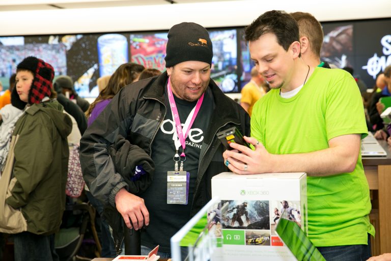 Customers purchased Xbox 360 video game consoles at the newest Microsoft at Woodland Hills in Tulsa, Okla., on Thursday, Nov. 20, 2014.