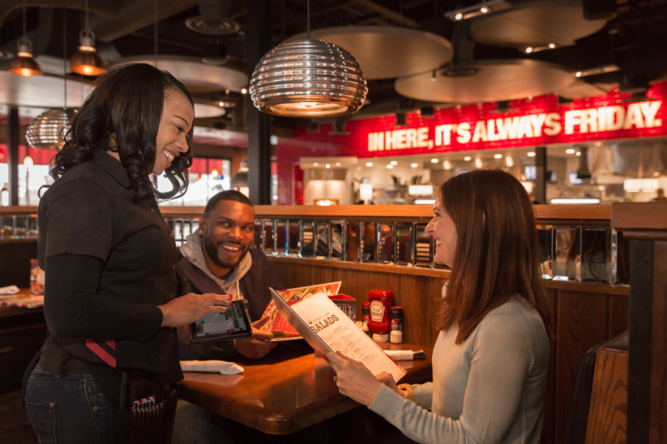 Wait staff at TGI Fridays are taking orders with tablets, improving the way they interact with customers.